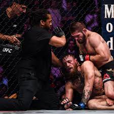 Round four conor vs khabib and the champion immediately gets mcgregor to the ground. Khabib Nurmagomedov Taps Out Conor Mcgregor Then Sparks Melee In Crowd Ufc The Guardian