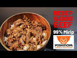 Keluarkan ayam dari panggangan, kemudian oleskan bumbu mentega. Video Yoshinoya