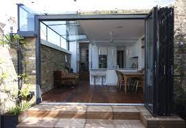 Where Is The Support For The First Floor Corner Perhaps The Head Of The Door Is Structural But It Seem Modern Patio Doors Pergola Plans Design Modern Patio