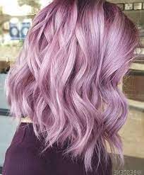 The top of the hair has been left very natural with this brunette look, and the ends have been colored using an ombre out of bright and light purples, and dark and warmer tones, the latter are most definitely the easier of the two to achieve. 50 Pastel Hair Color Ideas 2019 If You Re Looking For Something Simple And Warm Look No Furth Hair Color For Dark Skin Hair Color Pastel Colors For Dark Skin
