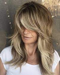 25 Volume Boosting Haircuts For 2021 Even Dolly Parton Would Approve Of Hair Styles Long Hair Styles Classy Hairstyles