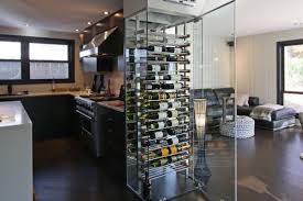 Magnifique Cave A Vin Vitree Dans La Salle A Manger Une Realisation De Millesime Wine Racks Cellier Amenagement Cave A Vin Cave A Vin