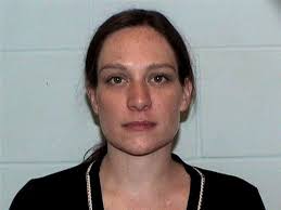 Funds Stolen From Bank Customers Were Given to Boyfriend, Warrant Says