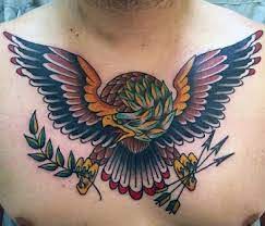 Gambar tato di punggung wanita ini sangatsimple dan sangat cocokdengan warna kulitnya, dan warna hitam serta putih kulinya sepertinya. Jagal Bertato Garuda Emas