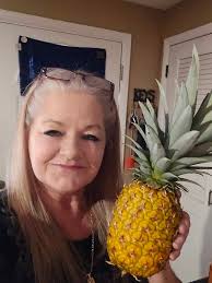 Following the advice of many of the folks here, I caged our pineapple to  protect it from raccoons and birds.