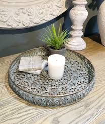 Serving trays & tray tables. Round Tray With Gold Tint Rustic Flower Design