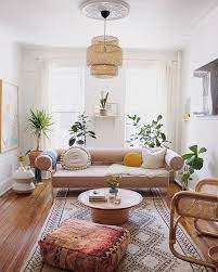 Soft Pretty Tones Make This Living Room Feel Lighter Brighter And Bigger Pretty Pastels Creamy Neu Chic Living Room Pink Sofa Living Minimalist Living Room