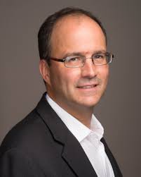 Steve Grove with Emilio Garcia-Ruiz