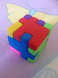 The first step is to take one of the notched pieces and stand it up so that it looks like the letter e. How To Make The Cube Eraser Puzzle 4 Steps Instructables