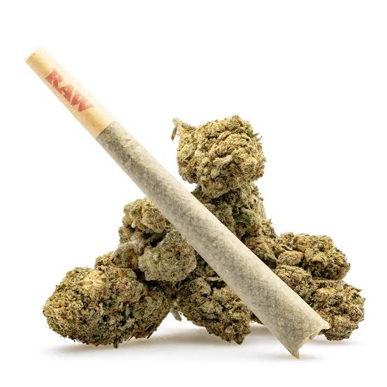 Where to buy Gelato - a pile of fresh Gelato cannabis buds with a pre-rolled RAW joint resting on top.