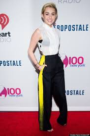 Miley Cyrus Wears A Sheer White Top With A Black Bra To Z100 S Jingle Ball Miley Cyrus Outfit Demure Outfit Fashion