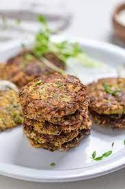 This baked zucchini fritters recipe is one of my most popular recipes. Vegan Zucchini Fritters Make It Dairy Free