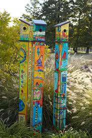 Secure the pole into the ground in your garden. Peace Art Poles Shefalitayal