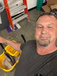 Camera mounted to gutter downspout with exposed wire