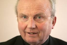 Roy Keane's father Mossie had charm and quick wit, funeral hears