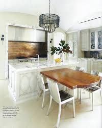 T Shaped Island Marble Trimmed Hood Via Atlanta Homes Kitchen Design Kitchen Island With Seating Marble Kitchen Island