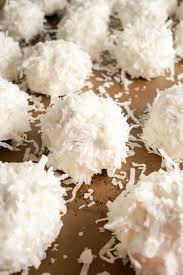 This Easy No Bake Snowball Cookies Recipe Brings A Sweet Taste Of Summer To Your Holiday Festivities Coconut Snowballs Snowball Cookie Recipe Snowball Cookies