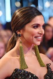 The Best Holiday Party Hairstyle For You According To Your Zodiac Sign Deepika Padukone Style Hair Styles Beauty
