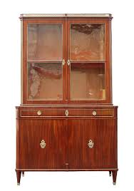 Any piece from a previous or distinct time period that is not 100 years old are considered vintage. German Mahogany Display Cabinet 19th C Vitrine