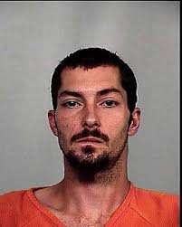 Man crashes car into Casper building, runs from police