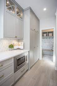 The largest collection of interior design and decorating ideas on the internet, including kitchens and bathrooms. Light Grey Cabinet Ideas Light Grey Kitchen Inspirations Kitchen Flooring Trends Kitchen Inspiration Design Hardwood Floors In Kitchen