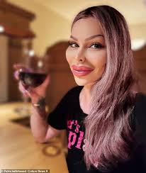 Gender-neutral office worker, 27, has spent over £55,000