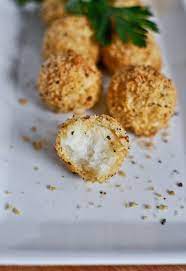 Crispy Parmesan Potato Puffs Re Pinning From My Potato Licious Recipe Board Crispy Parmesan Potatoes Recipes Parmesan Potatoes