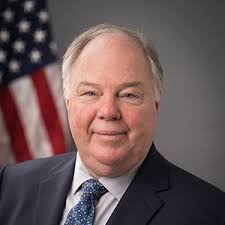 Commissioner Max Vekich