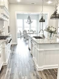 33 Extraordinary All White Small Kitchen Ideas To Look Wider And More Comfortable Goodsg White Kitchen Design Rustic Farmhouse Kitchen Gray And White Kitchen