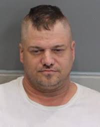 Associate Of Man Charged In Fire That Burned 2 Officers Is Taken Into  Custody