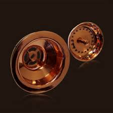 polished solid copper sink drains and