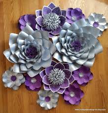 Check out our purple paper flower selection for the very best in unique or custom, handmade pieces from our backdrops & props shops. Paper Flower Backdrop Paper Flowers Wedding Backdrop Purple And Silver Flowers Plum And Gray Wedding