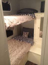 But the real news crosses the aft wall with triple bunk beds with room for 3 adults. Bunks Camper Renovation Finished Go Me It Turned Out Beautiful Camper Bunk Beds Camper Renovation Camper Bunk Bed Ideas
