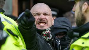 Right-wing thug's ridiculous excuse for why he was wearing gloves with  reinforced knuckle-pads at Neo-Nazi rally