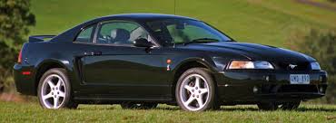 In 01 the cobra received a rear bumper with cobra on it and larger side vents. Ford Mustang Cobra Review Carsguide