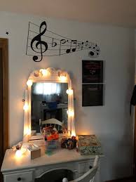 Music themed pink girls bedroom with music notes across the wall and faux canopy bed. Broadway Themed Bedroom Baby