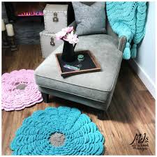 Puff stitch in the middle of this little square is really interesting element, because it stands out and adds to the structure. Crochet Flower Rug Video Tutorial Mj S Off The Hook Designs