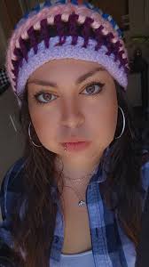 Crochet beanie, handknitted vest and pant set