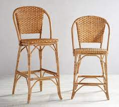 From the 1930s to the 1950s, chairs like these welcomed writers, artists and travelers at sidewalk tables from paris to the cote d'azur. Parisian Woven Bar Counter Stool Pottery Barn