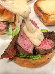 Place meat on grill to brown, about 5 minutes each side. Rib Eye Sliders With Garlic Parmesan Cream Sauce Parmesan Cream Sauce How To Cook Steak Cream Sauce