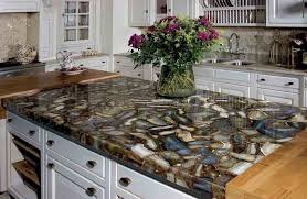 Old laminate countertops can become scratched, stained, and chipped over time. Mosaic Countertops Natural Stone Mosaic Countertop Kitchen Countertops Replacing Kitchen Countertops Kitchen Cabinets And Countertops
