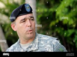U.S. Army Col. Timothy M. Ryan, rear detachment commander of the 25th  Infantry Division, answers questions during a news conference Thursday,  Aug. 23, 2007, at Schofield Barracks, Hawaii. Ten Schofield Barracks  soldiers