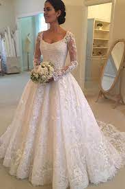 Inspired by classic romance, ballgown wedding dresses feature full, voluminous skirts draped in soft tulle or sophisticated satin. Long Sleeves Scoop Off White Lace A Line Elegant Wedding Dresses Okg93 Long Sleeve Ball Gown Wedding Dress Wedding Dress Train Ball Gowns Wedding
