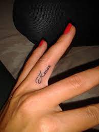 This is what inspires tattoo artists to include names in some personalized tattoo designs, which can be the bearer's own name or the name of his loved ones. Pin By Ali Baba Tattoo On Our Tattoo Work Signature Tattoos Small Finger Tattoos Name Tattoo On Finger