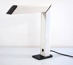Huang was produced in taiwan in the 1980s, and has a slender shape. Toucan Lamp 70s Minimal Retro Design Bdf
