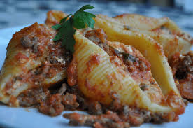 Pasta Shells Filled With Ricotta And Baked In A Tomato Meat Sauce A Maltese Mouthful Recipe Stuffed Pasta Shells Cooking Recipes Maltese Recipes