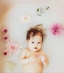 The first step to make a milk bath is to fill the tub with water at a desired temperature. 10 Quick Tips To Make Magical Memory Of Your Little One With Milk Bath Photography Baby Milk Bath Milk Bath Photography Milk Bath