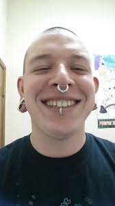 Smiley done by Jim at High Priestess in Eugene, Oregon. : r/piercing