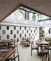 Opa S Meroma Restaurant Is Set In An 80 S Modernist Building In Mexico Restaurant Exterior Interior Design Cafe Interior