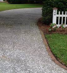 When bought in bulk, seashells are on the more affordable end of the spectrum: Oyster Shell Concrete Driveway Beach House Exterior Driveway Landscaping Exposed Aggregate Concrete